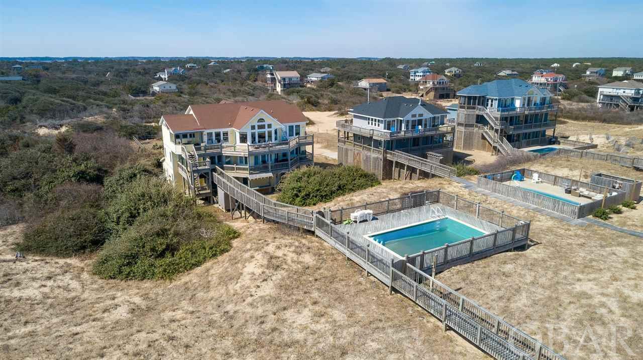Corolla, North Carolina 27927, 9 Bedrooms Bedrooms, ,9 BathroomsBathrooms,Single family - detached,For sale,Sandfiddler Road,105586